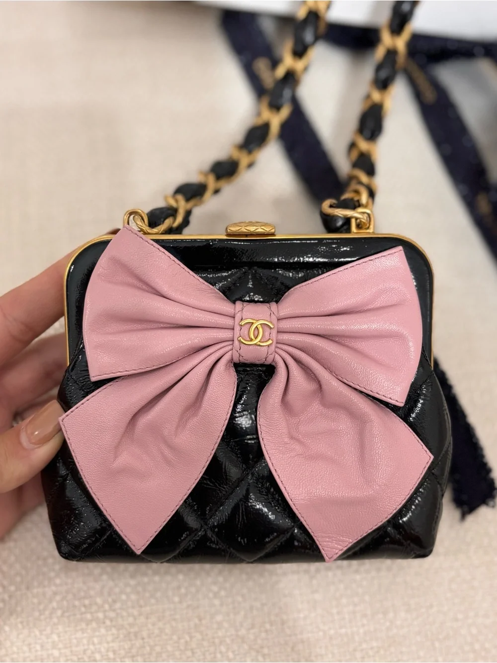 Authentic CHANEL mini pink bow black lambskin patent leather crossbody bag